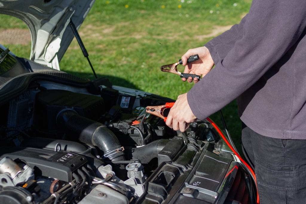 Car battery warning signs: corrosion on battery terminal