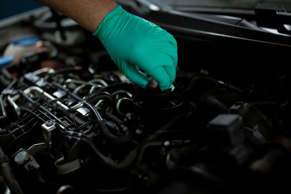 Mechanic performing car maintenance