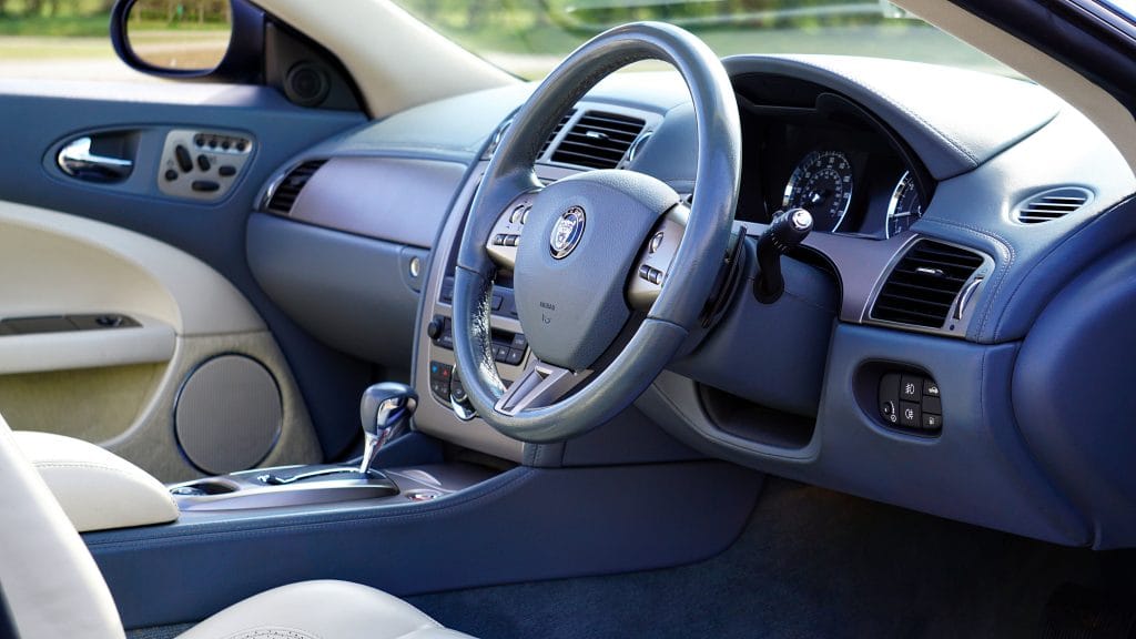 Inspecting used car interior and dashboard condition