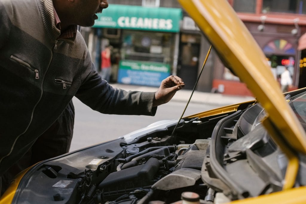 : Oil change interval: checking oil on dipstick