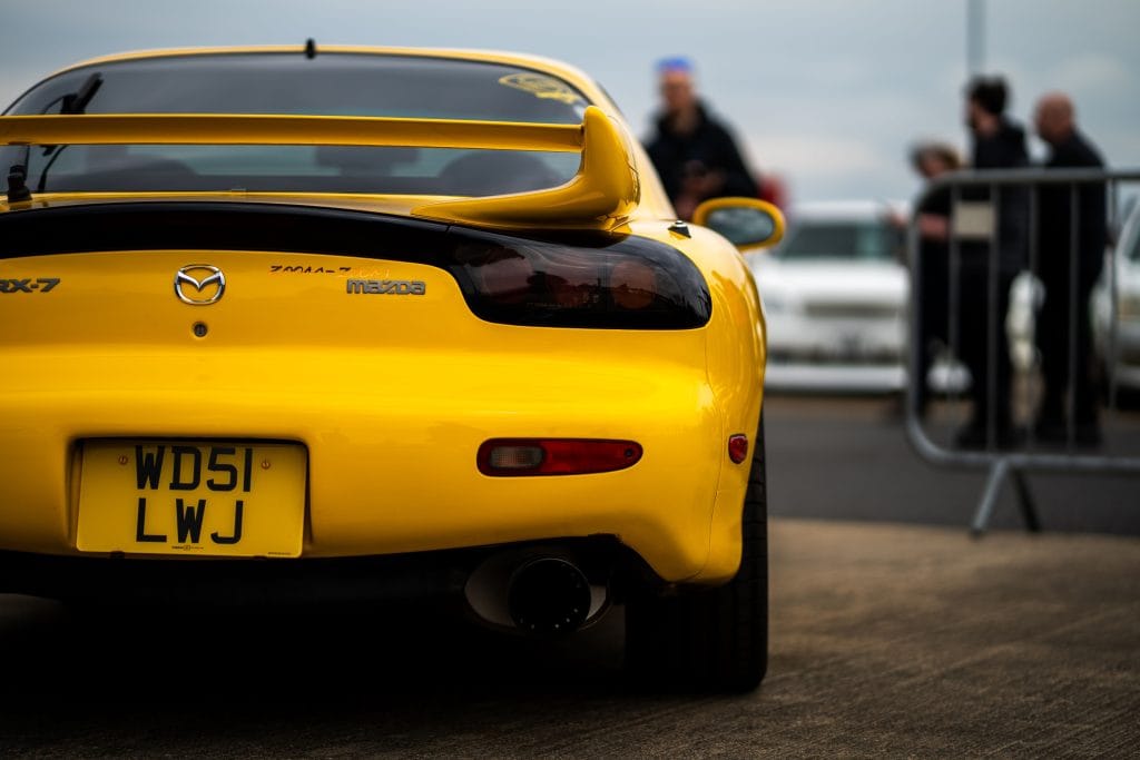 First-generation Mazda RX-7 rotary engine sports car SA22C with pop-up headlights